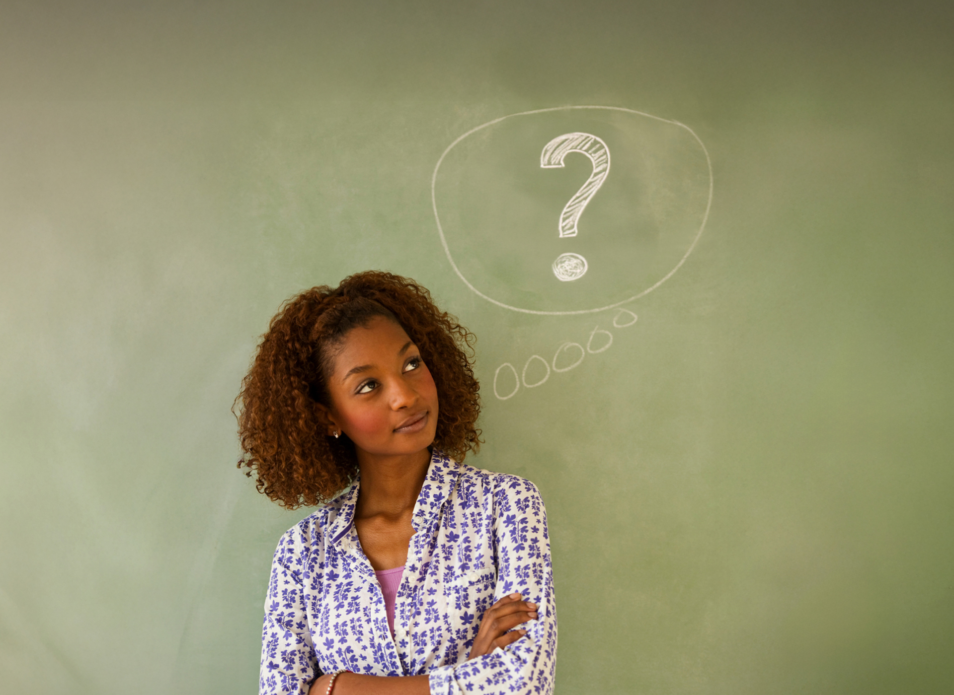 young black woman with a question mark above her head